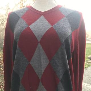 Blue argyle sweater. This vintage sweater is made... Depop