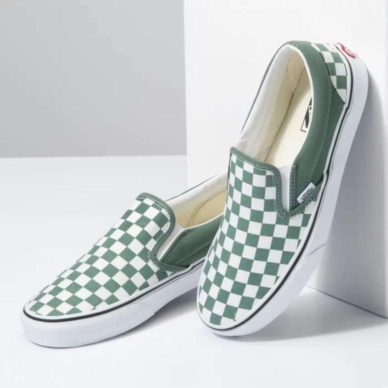 dark green vans slip on