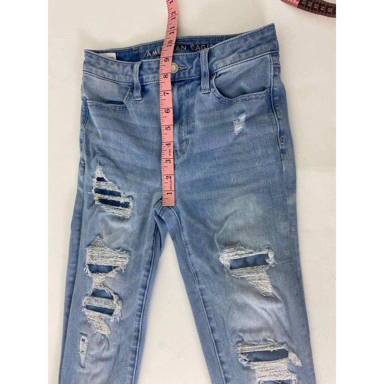 American Eagle Super Hi-Rise Jegging Light Wash... | Depop image.