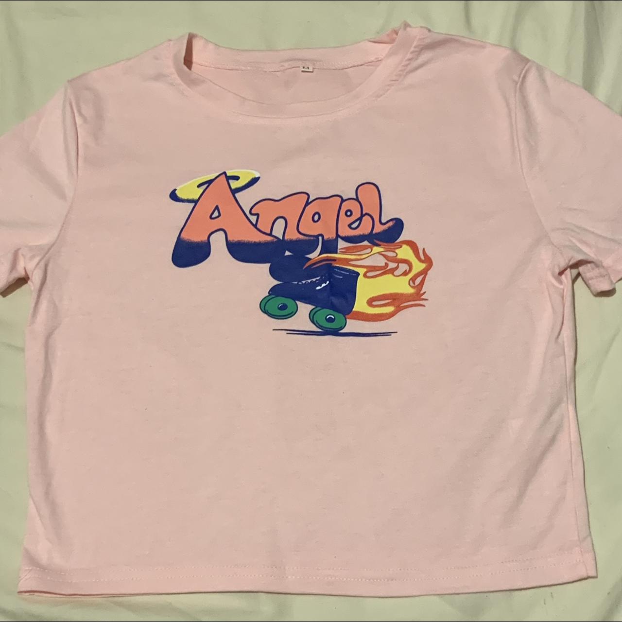 Pink angel crop top Never worn Size M Can fit size... - Depop