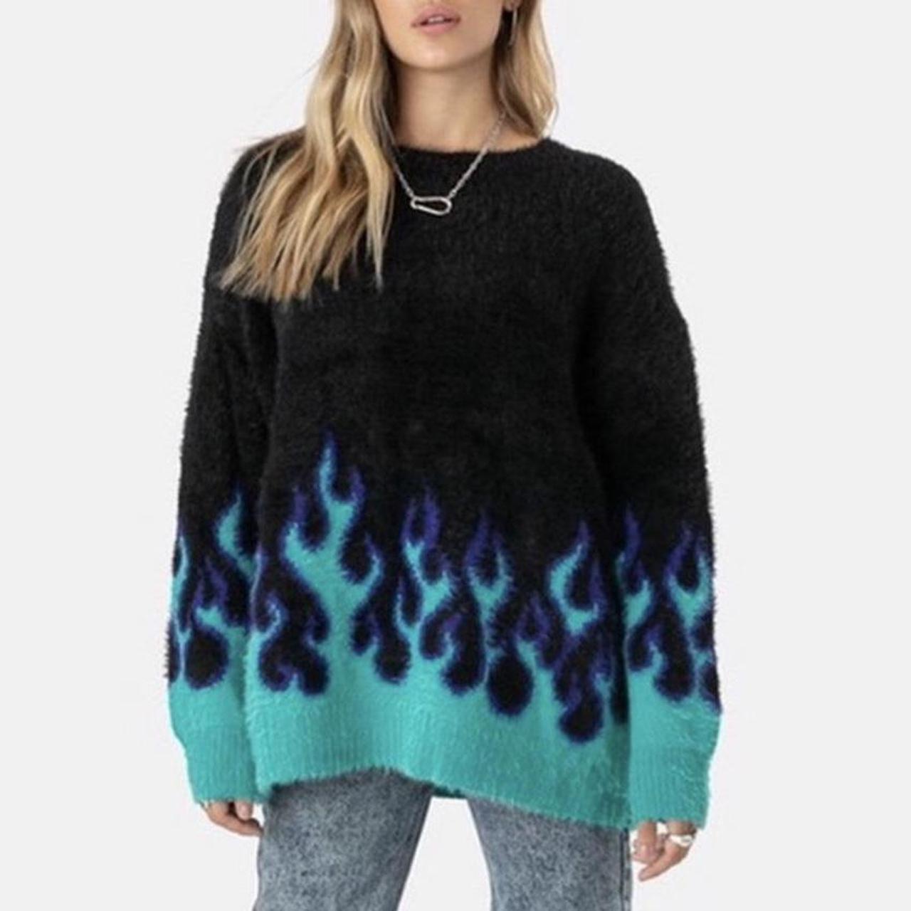 black sweater with blue flames
