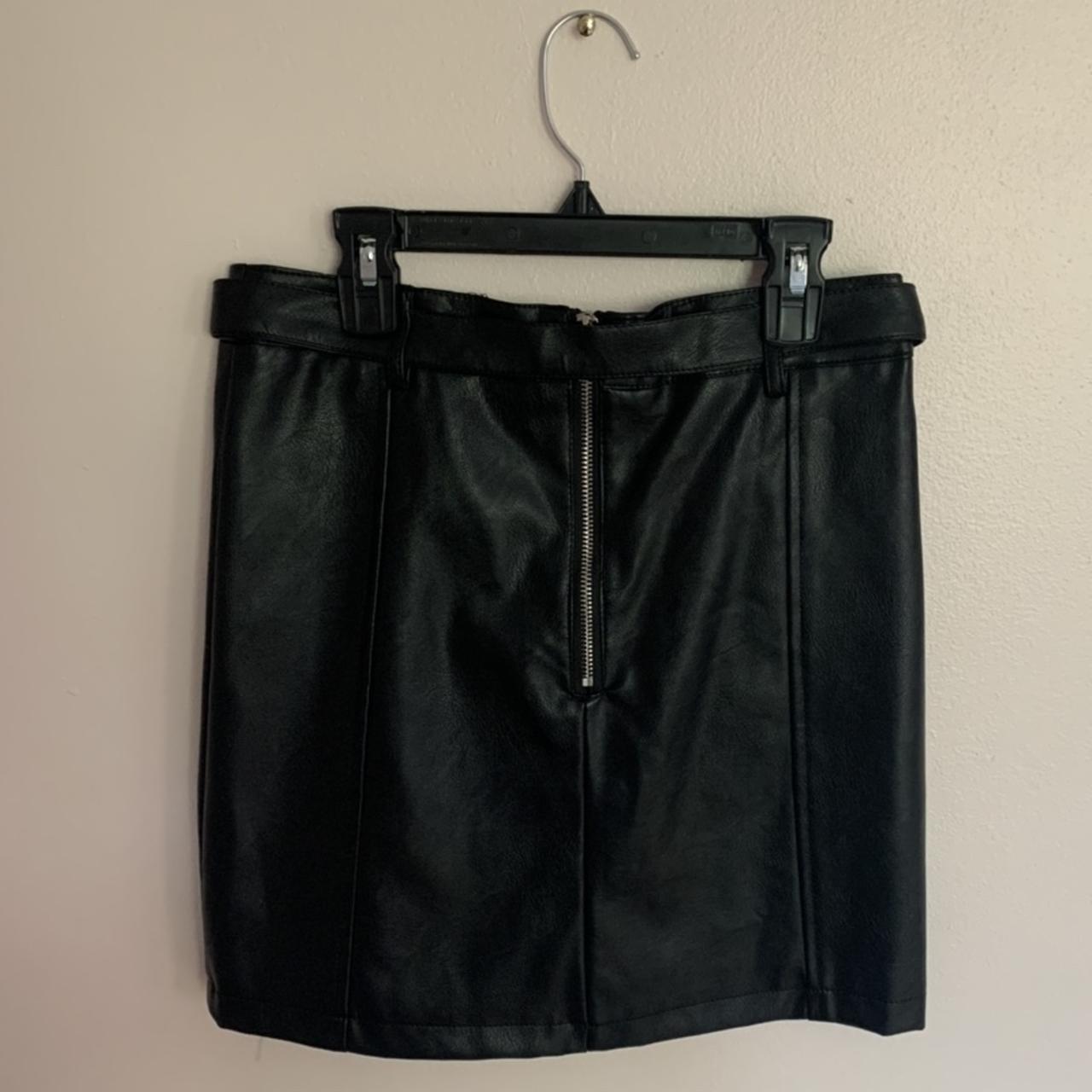 Black moto mini skirt Black faux leather moto style... - Depop