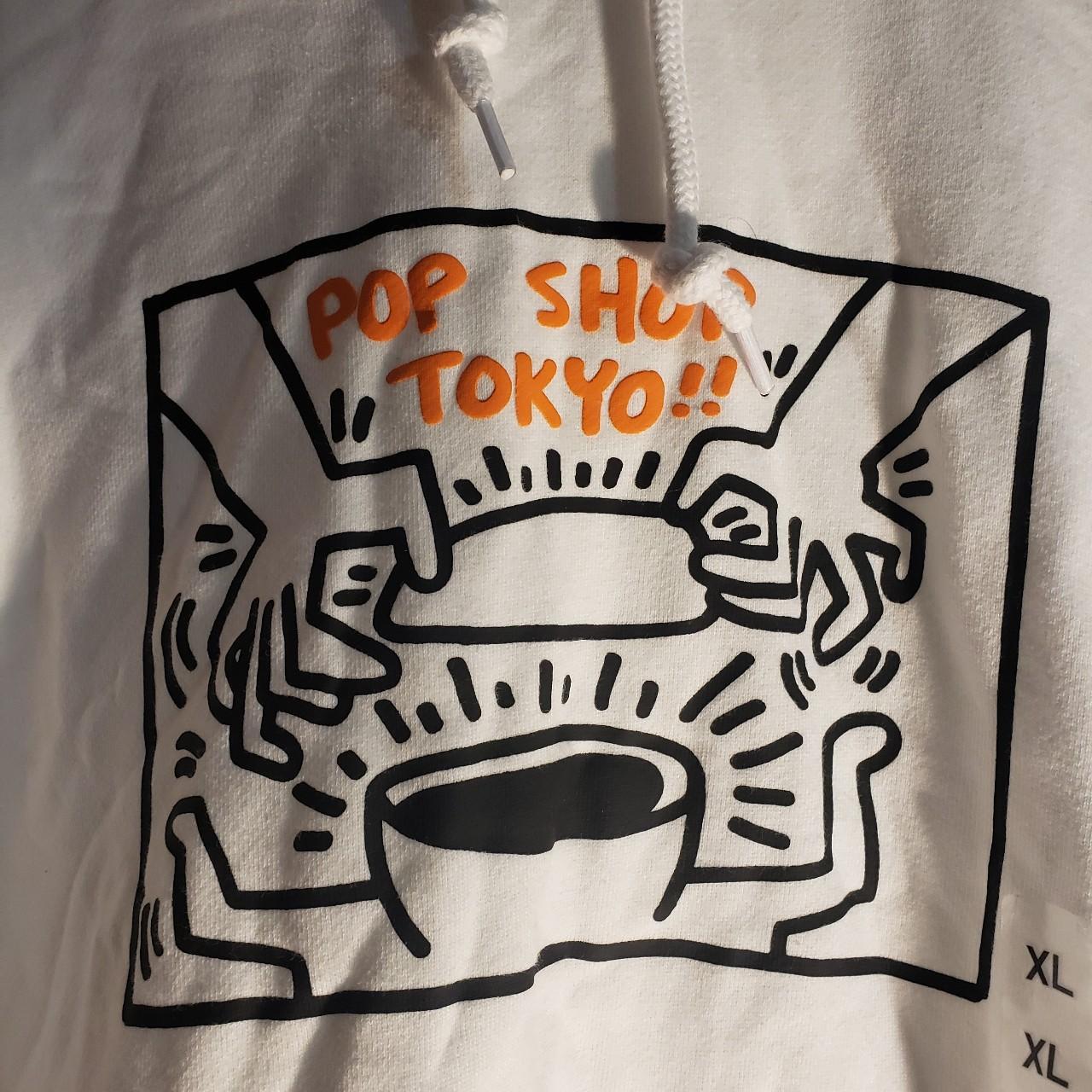 UNIQLO Men's White and Orange Hoodie Depop