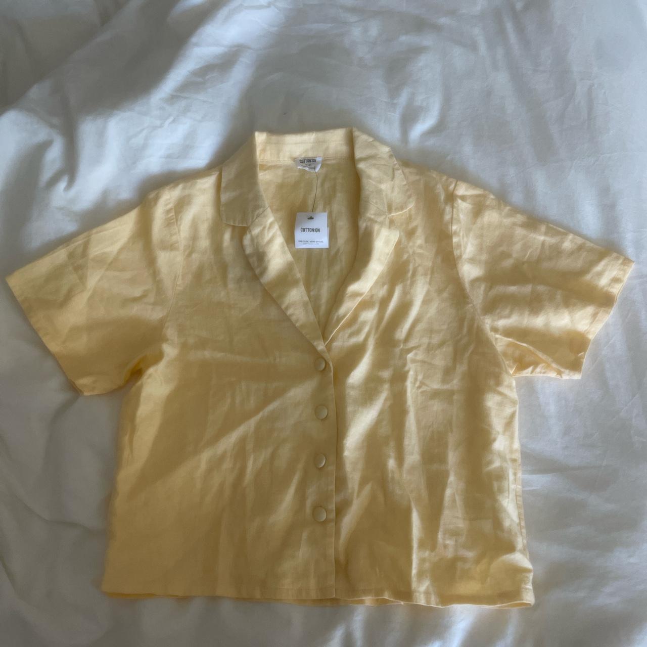 cotton on brand new with tags yellow button up.... Depop