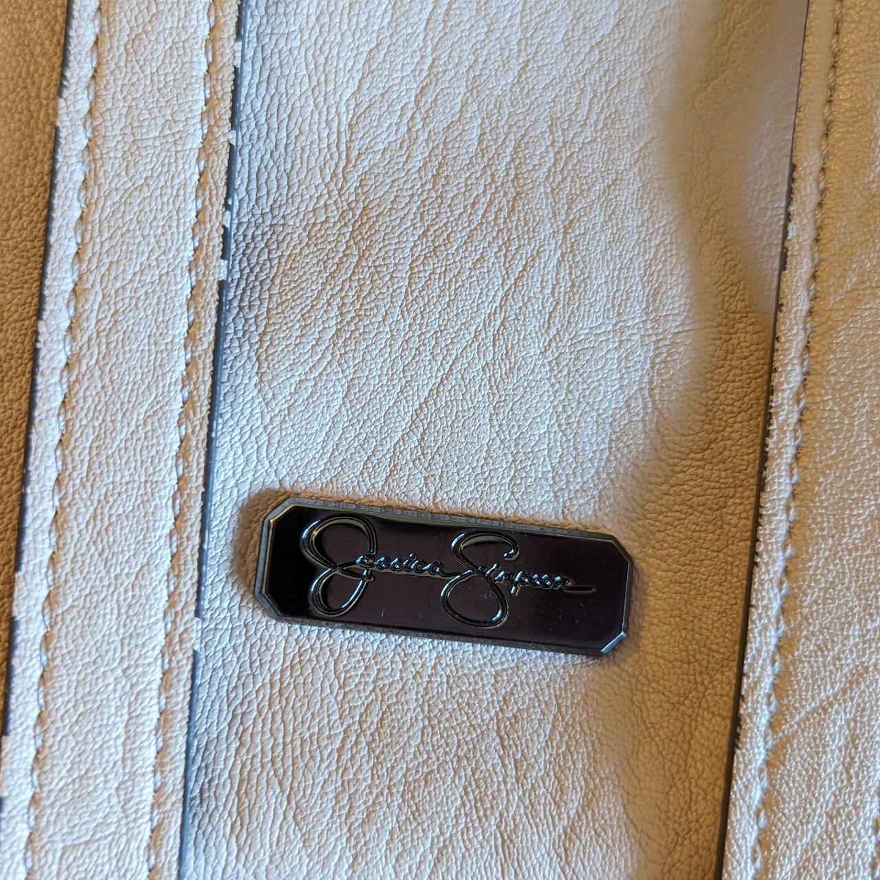 This light pink Jessica Simpson purse is in... Depop