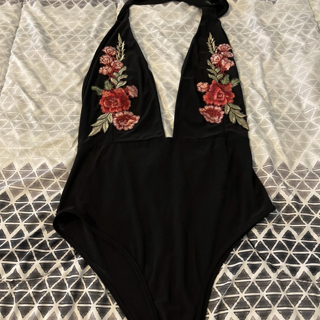 Open Floral Bodysuit. Shows cleavage, open from... - Depop