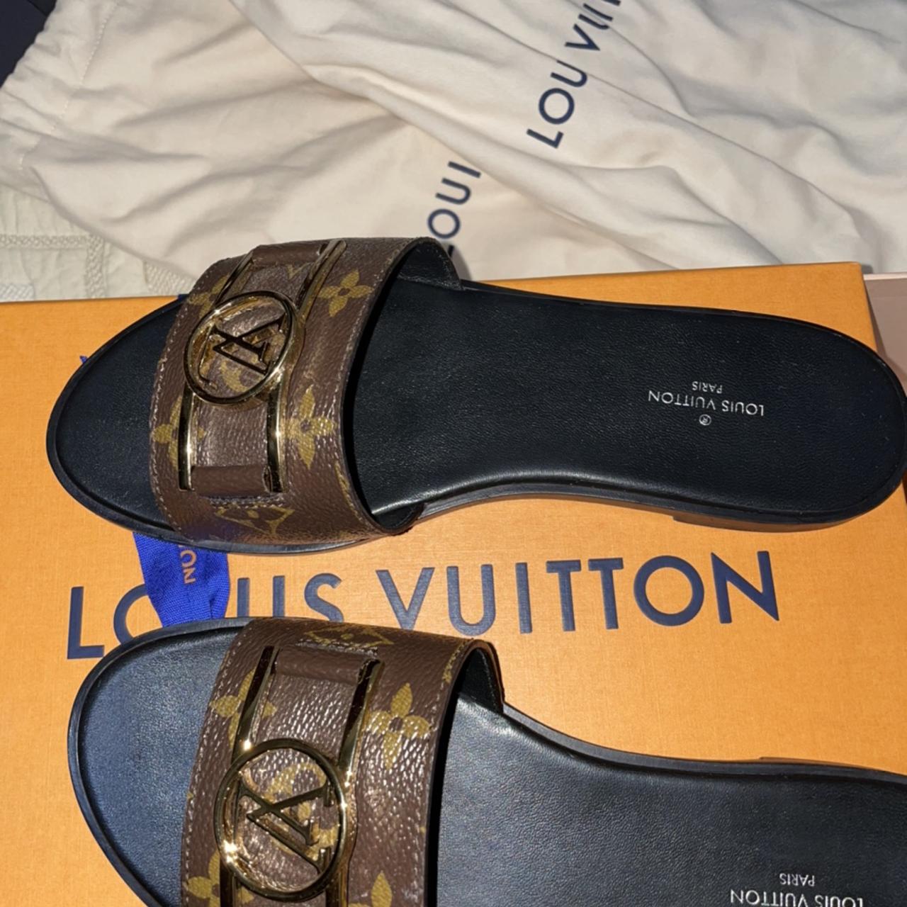 Louis Vuitton lock it flat sandals/mules. Purchased - Depop