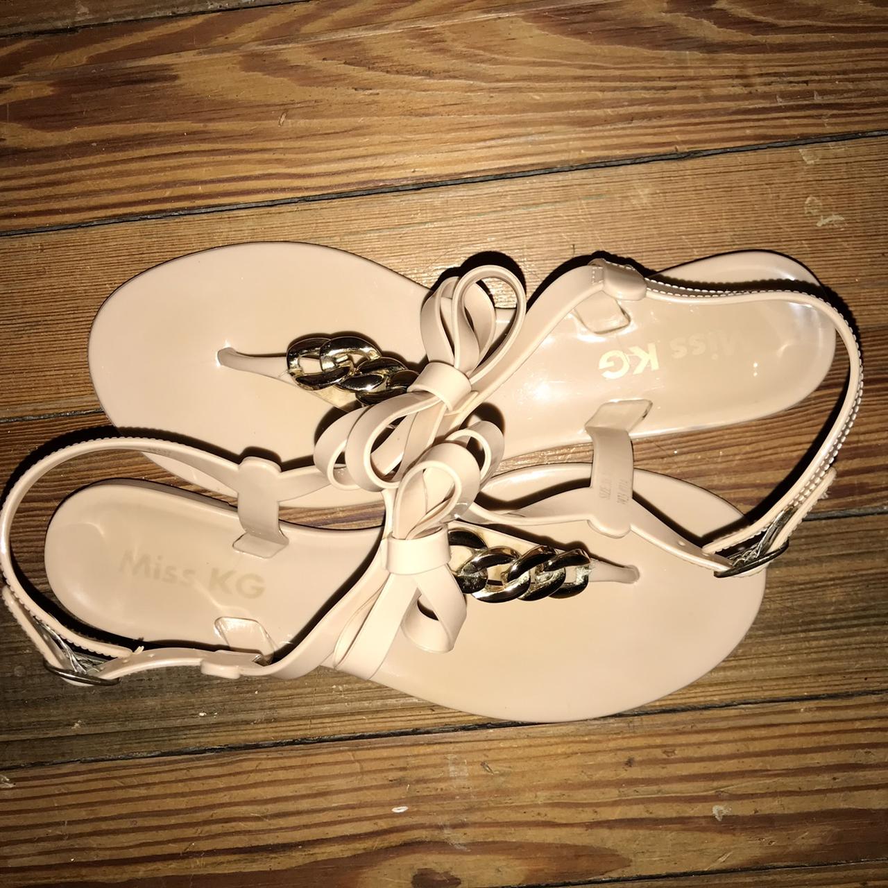 KG Kurt Geiger nude jelly sandal with bow gold Depop