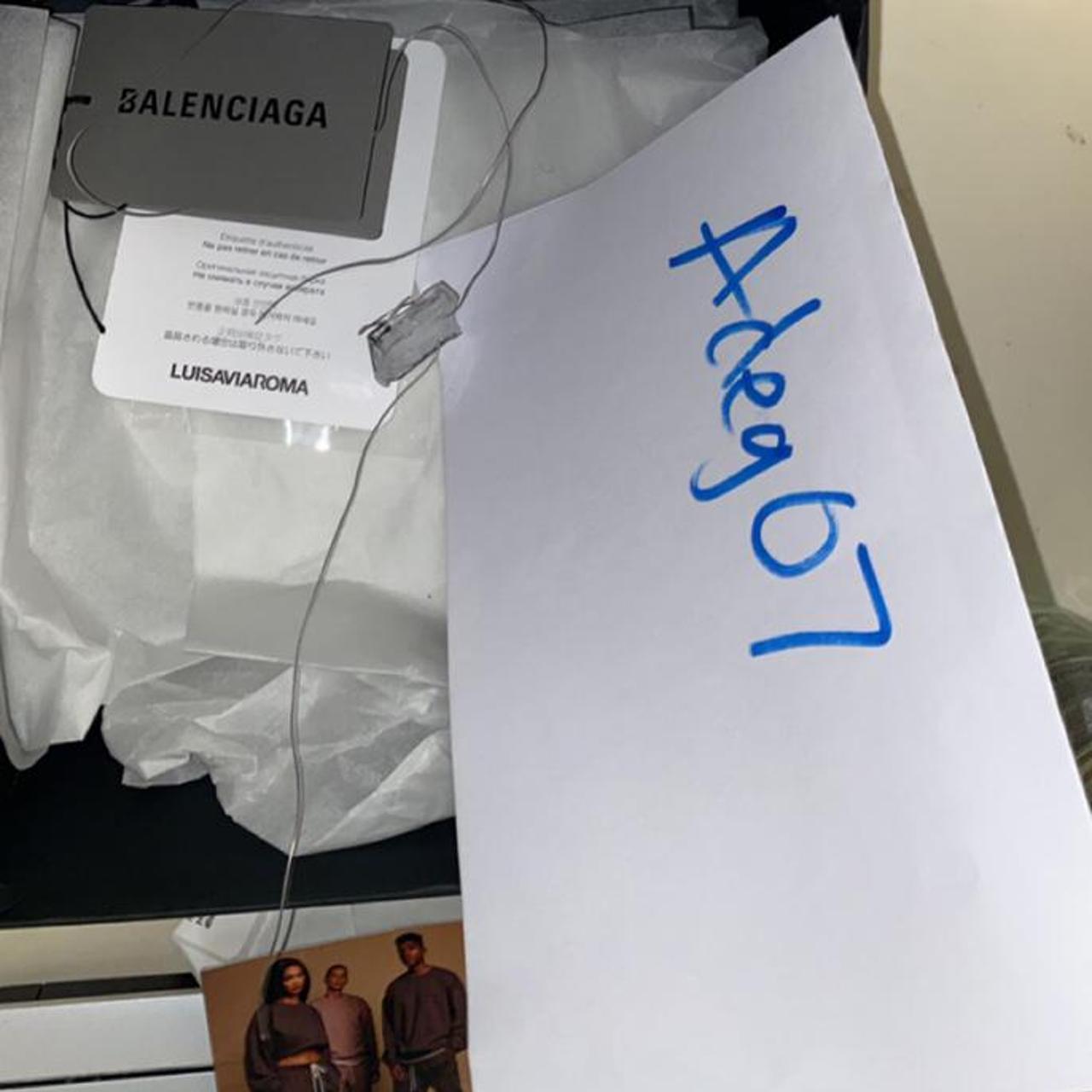 Balenciaga dust deals bag fake