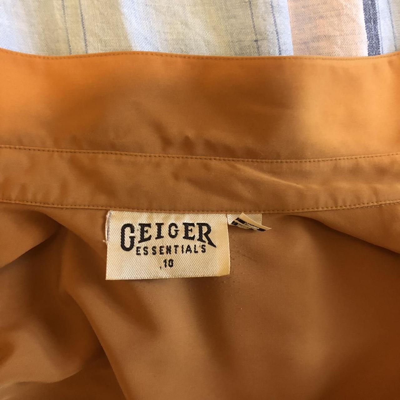 Rust orange shirt. This is amazing fabric - never... - Depop