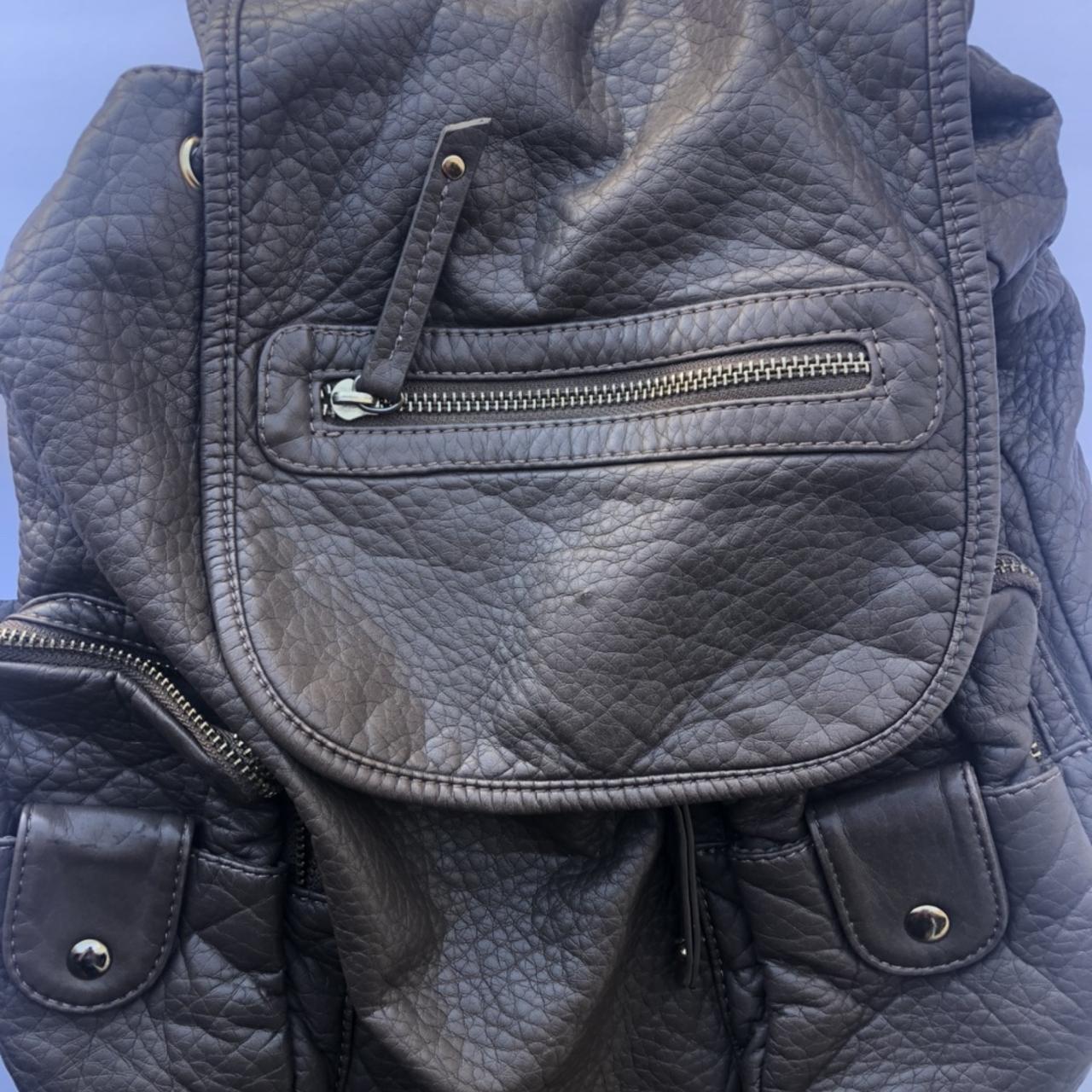 under one sky leather backpack
