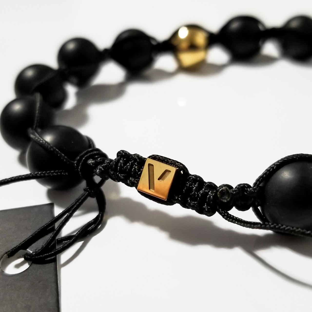 Top Vitaly- black beaded bracelet