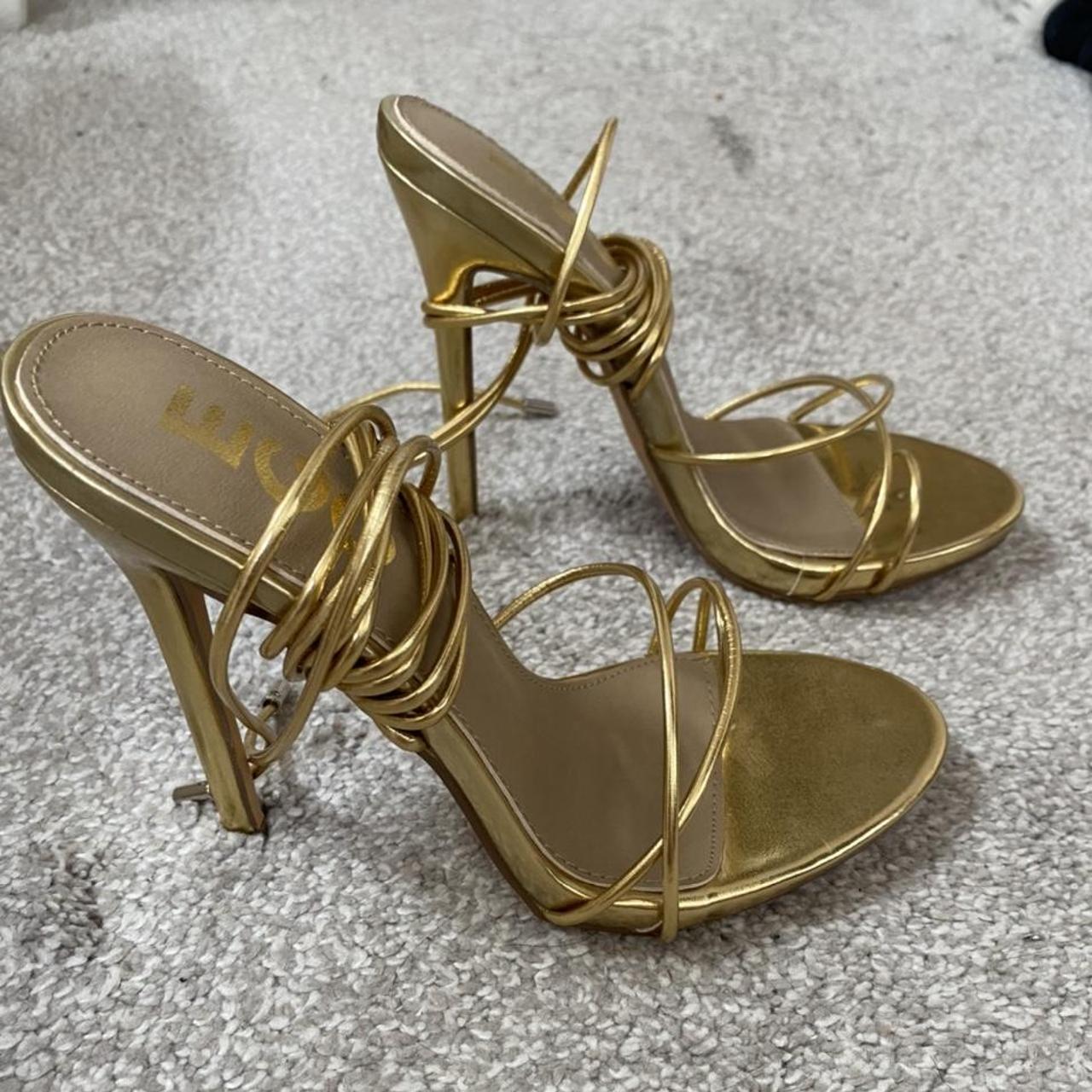 Gold lace up heels, size 5 but fit size 4. Only worn... - Depop