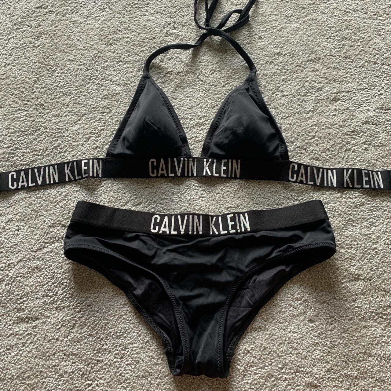 Calvin Klein black bikini (The bikini the woman is... - Depop