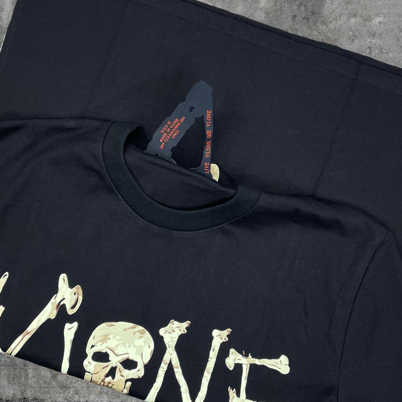 VLONE Lost Bone Ivory on Black T-shirt. •... - Depop