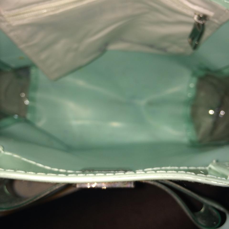 I got a Ted Baker bag for 50p in the charity shop - it was mangled & dirty  but I got it back to near perfect, here's how