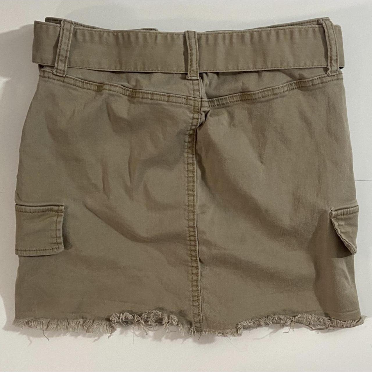Khaki colored Y2K cargo mini skirt with loop belt... - Depop