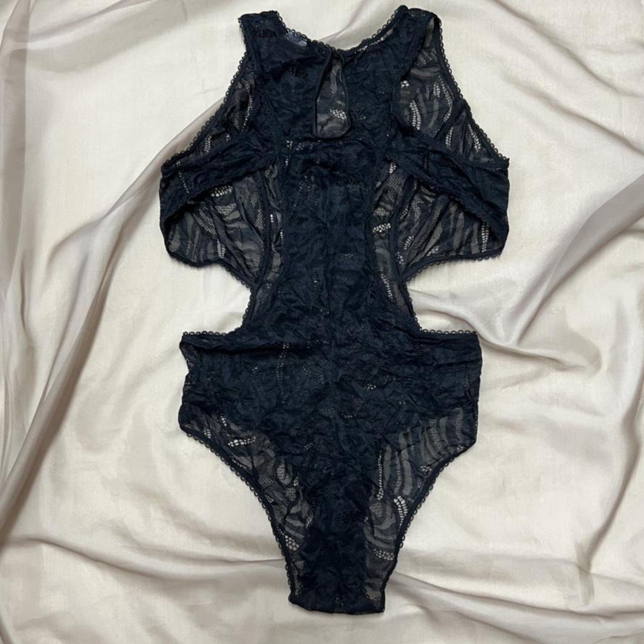 Black lace tank bodysuit with side cutouts NWOt,... Depop