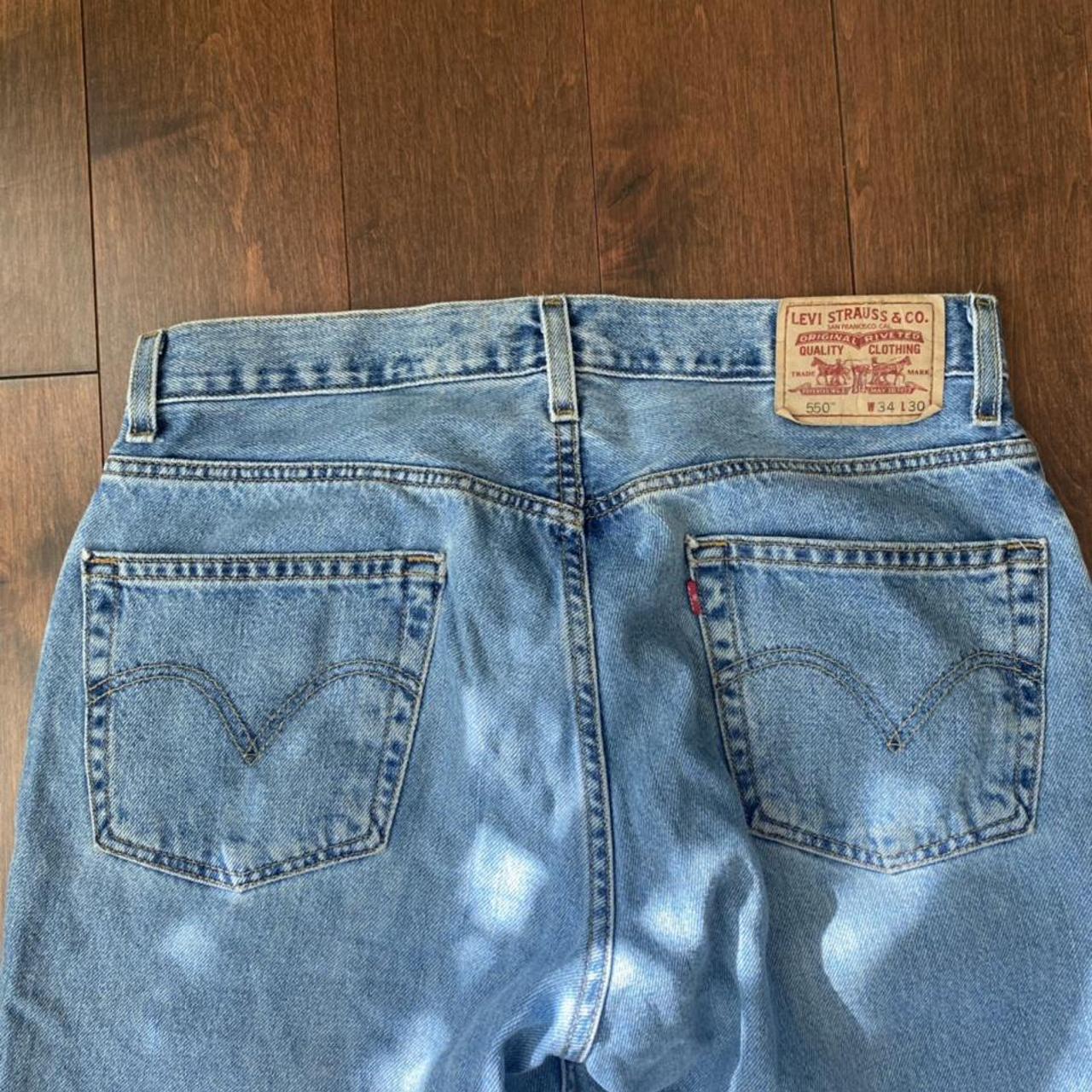 Levis 550 Relaxed fit jeans. W34 L30 small rip... - Depop