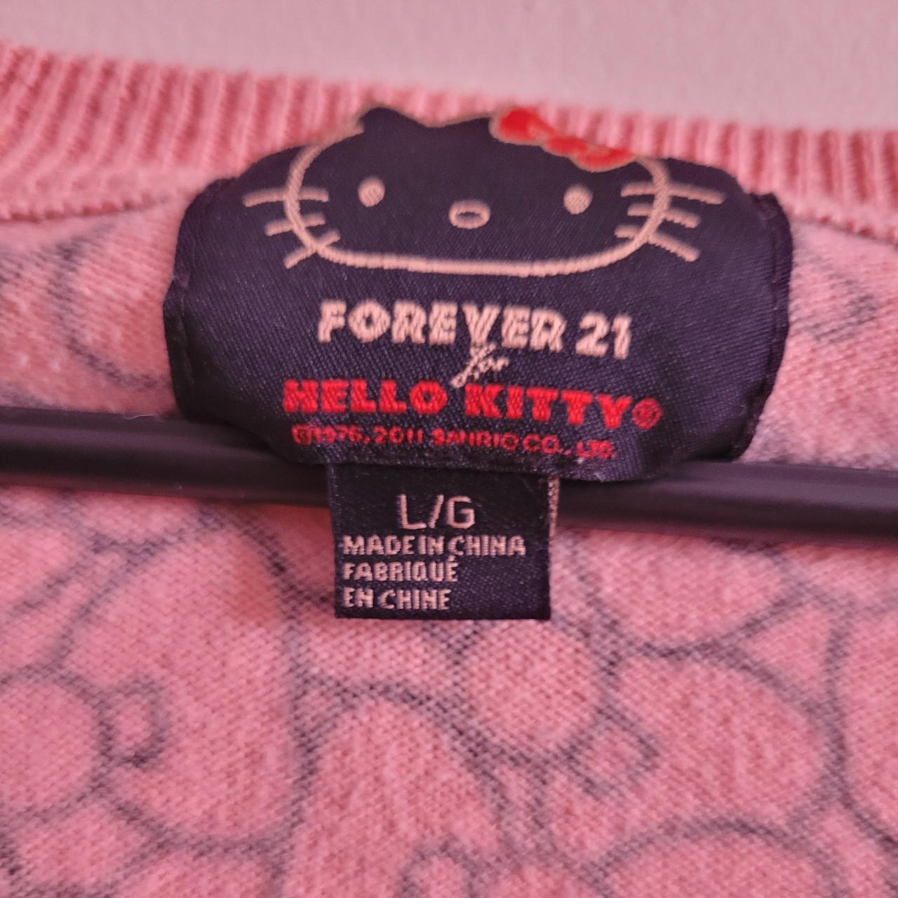 Pink Hello Kitty cardigan in great condition Looking... Depop