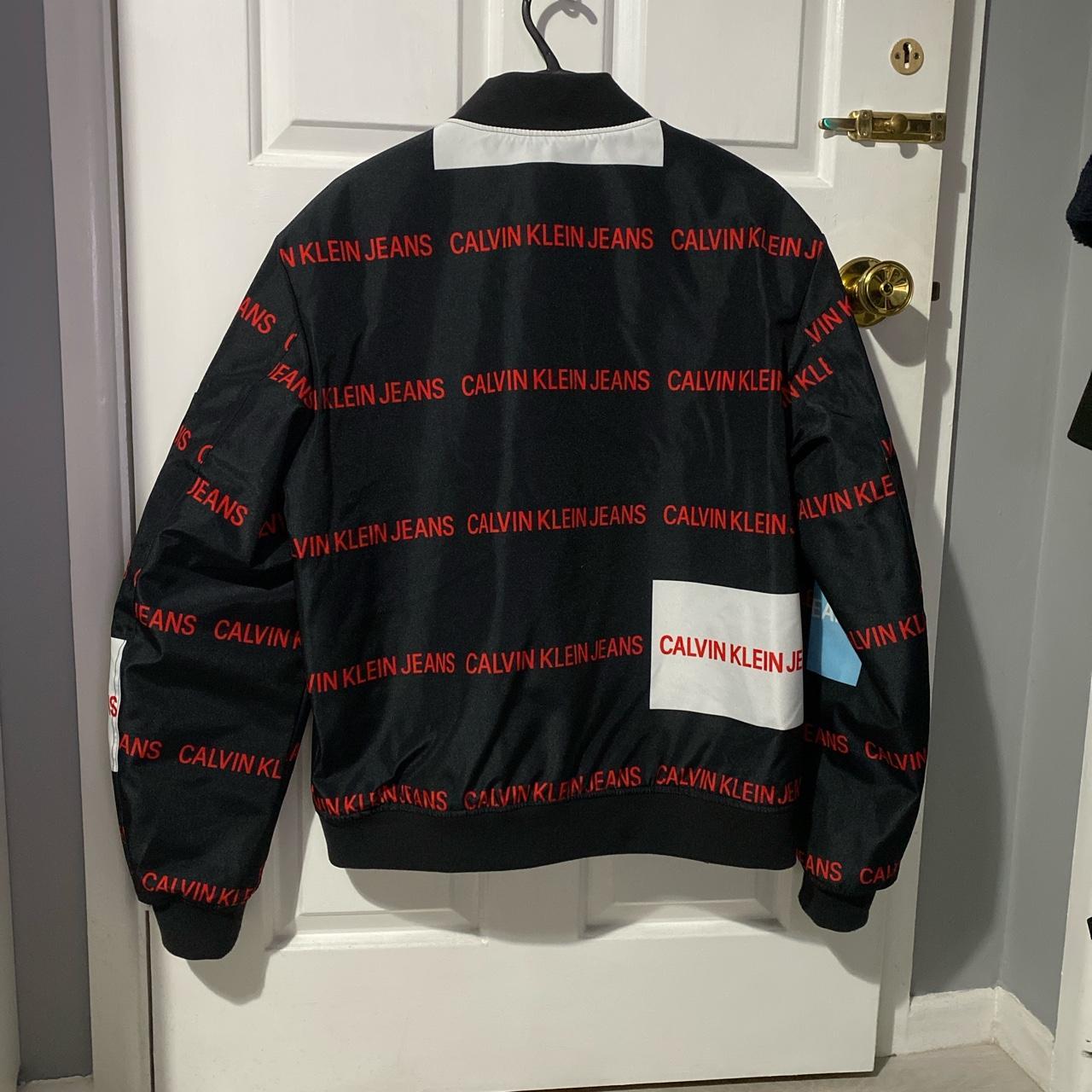 Calvin klein multi logo puffer jacket best sale