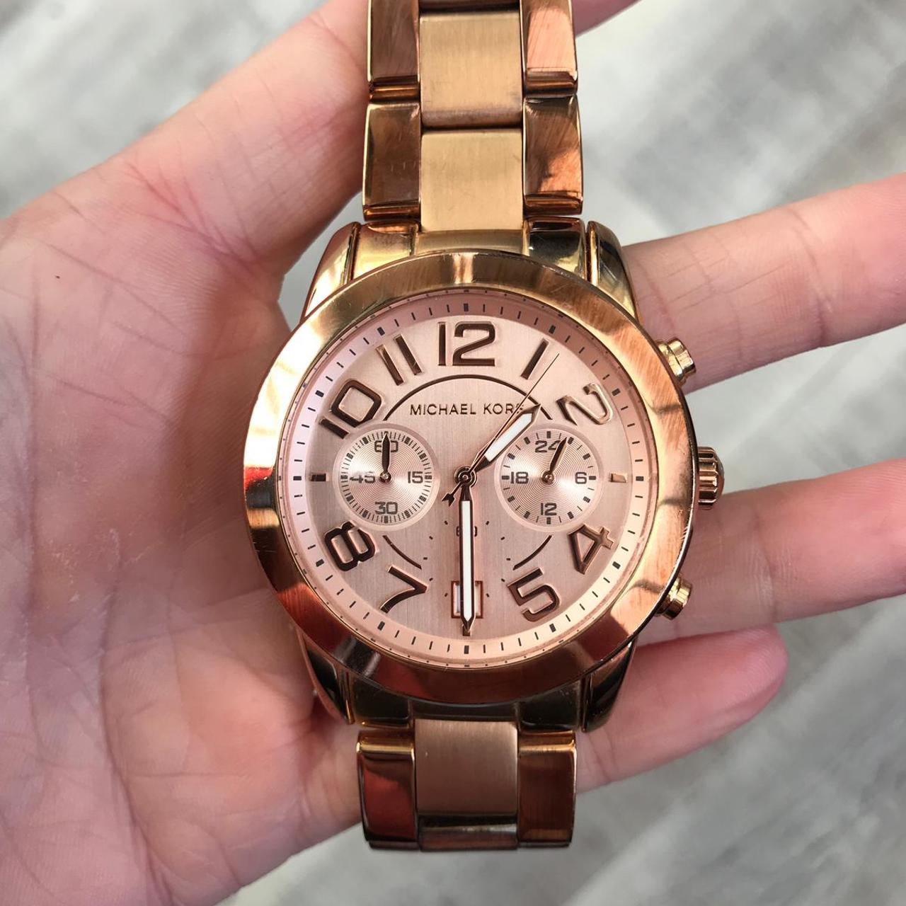 Michael kors rose gold best sale watch fading