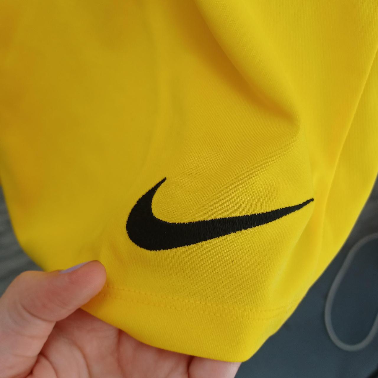 mens nike shorts yellow