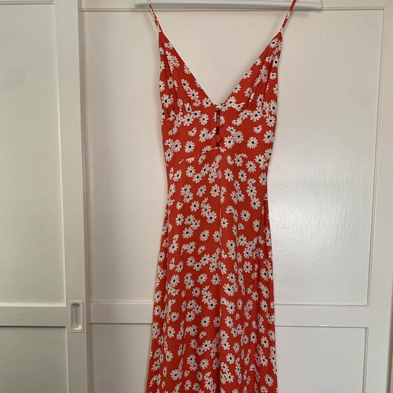 Reformation Montague dress in red daisy floral