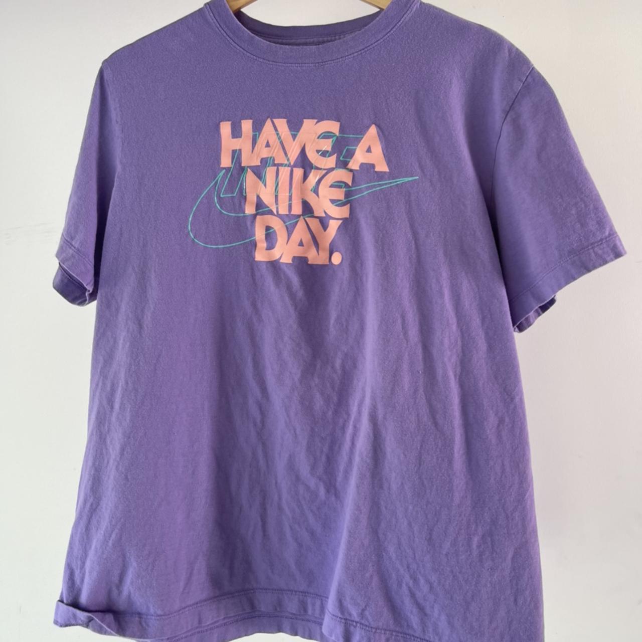 have a nike day t shirt purple