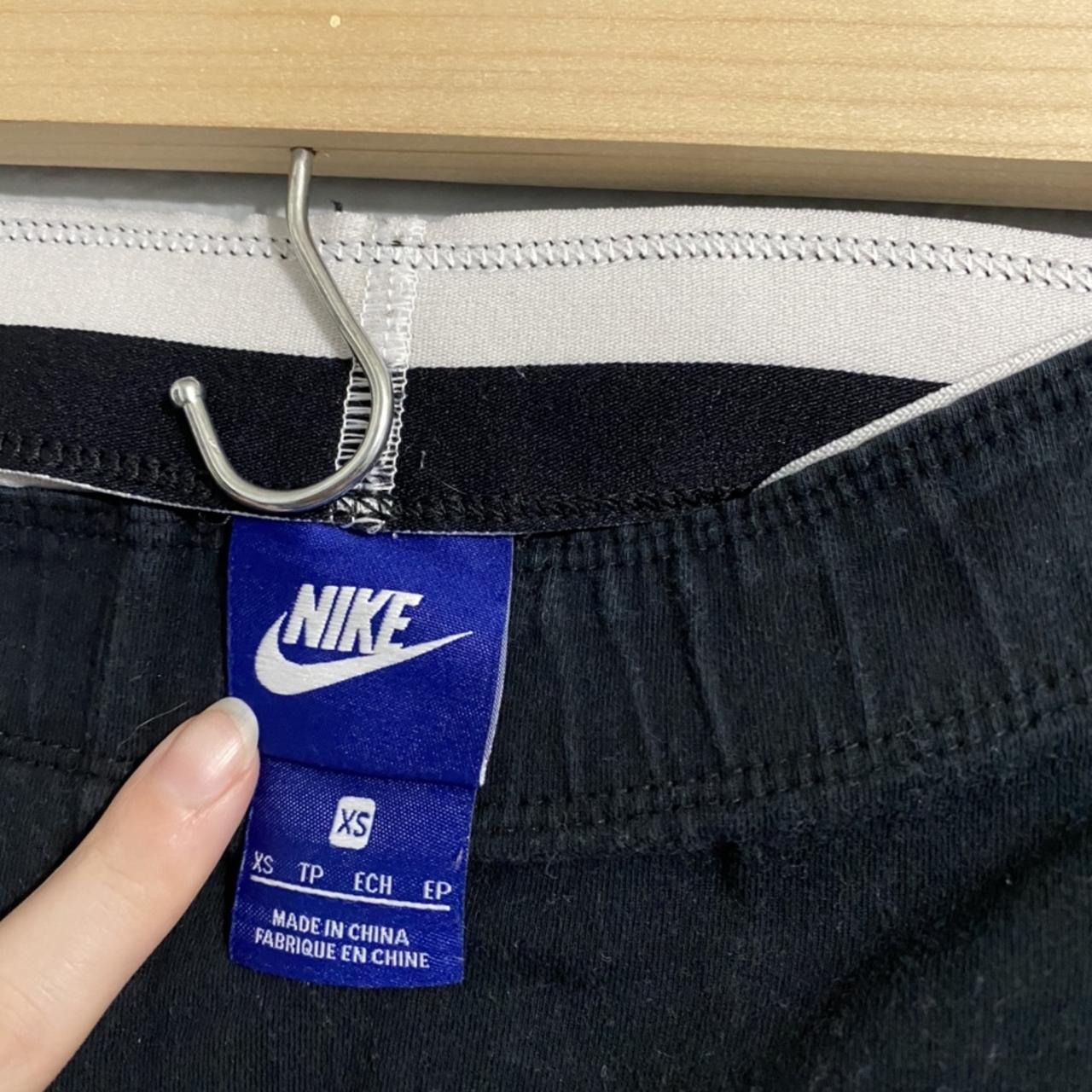 nike leggings with shiny blue detail , most accurate