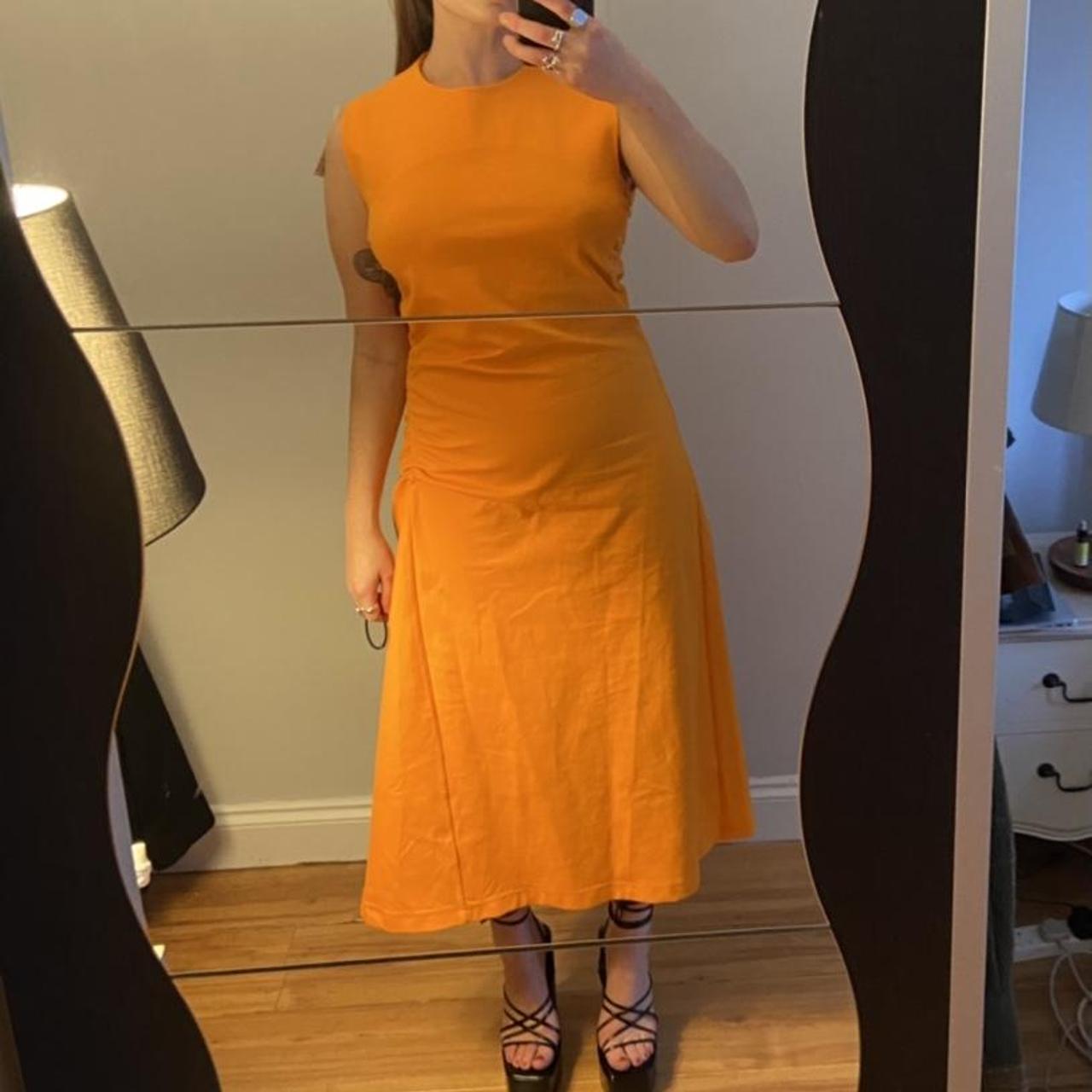 COS orange dress midi size in M. Would say fits... Depop