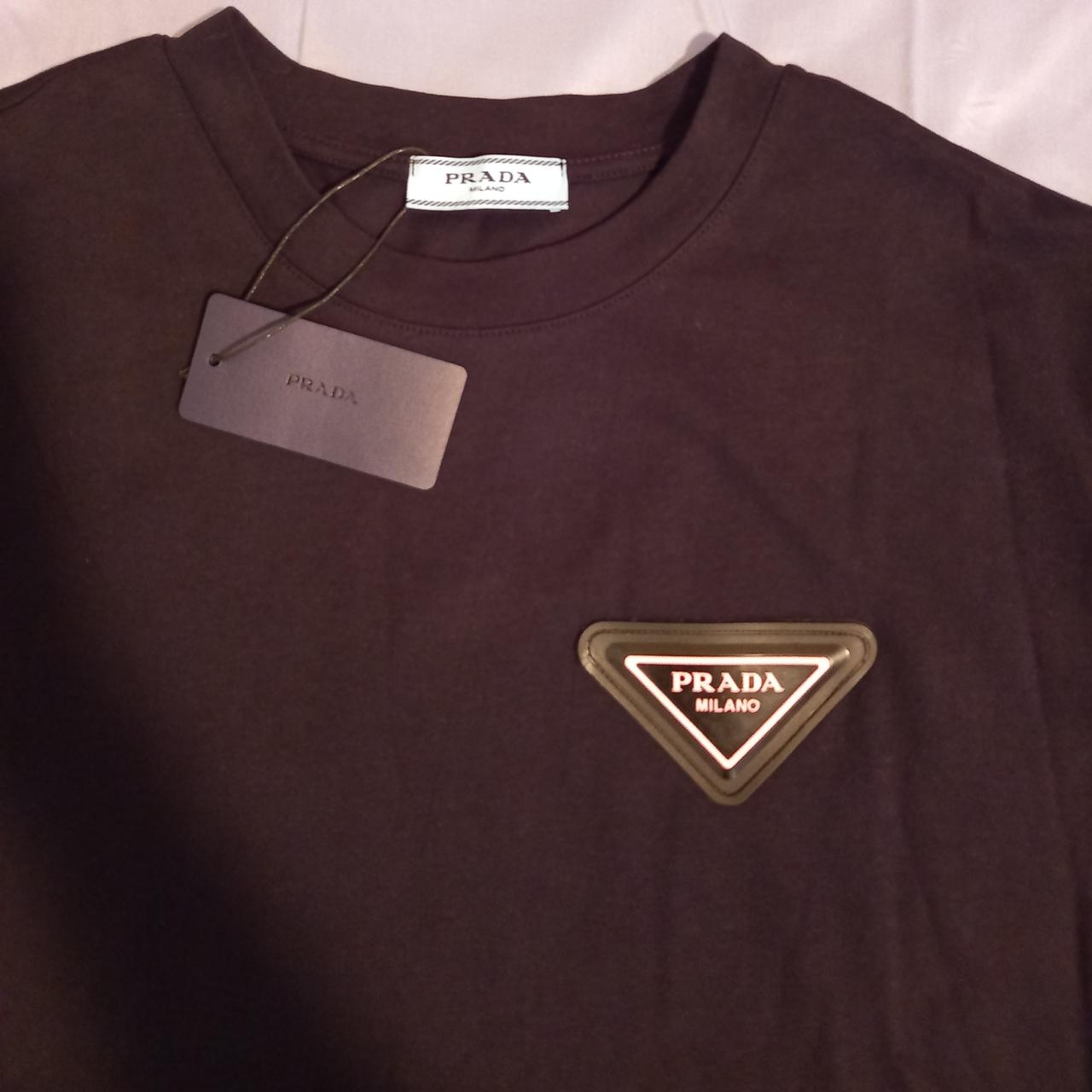 Prada tee shirt with pink prada logo size mediun | Depop