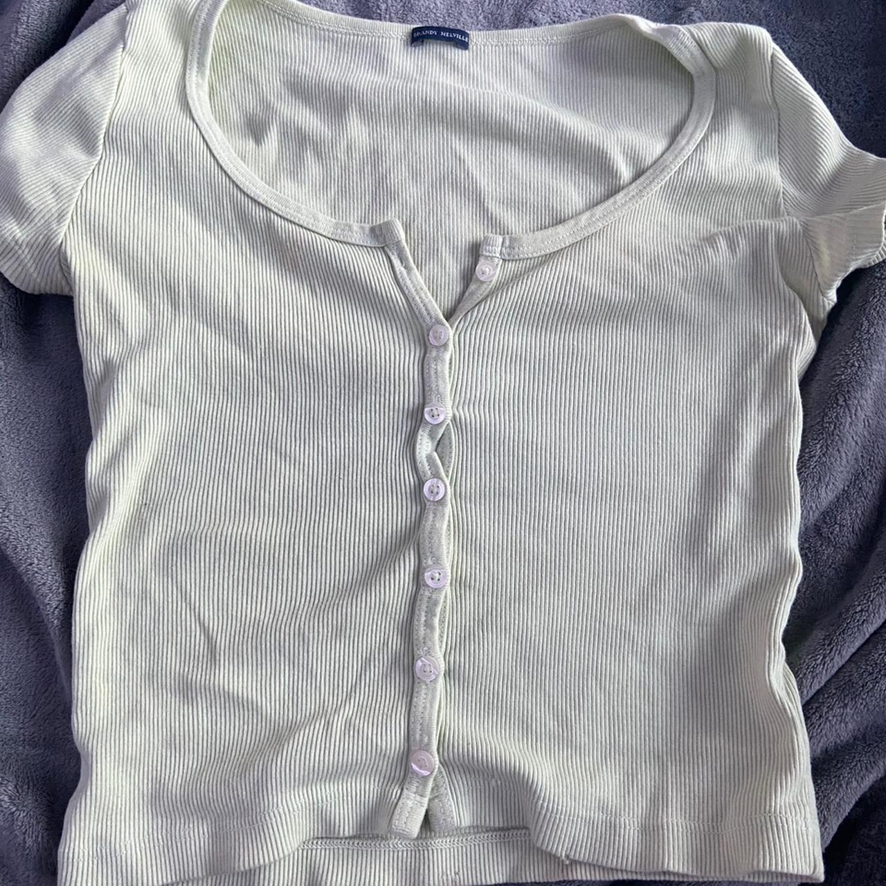 light green brandy melville button up top, so cute... Depop