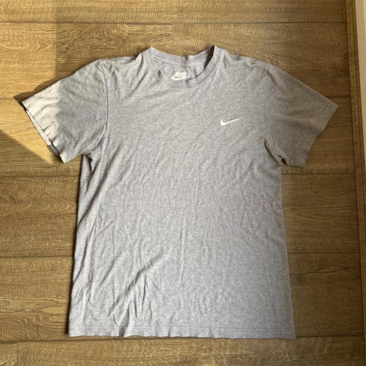 Grey Nike t shirt. Plain grey Nike t with white... - Depop