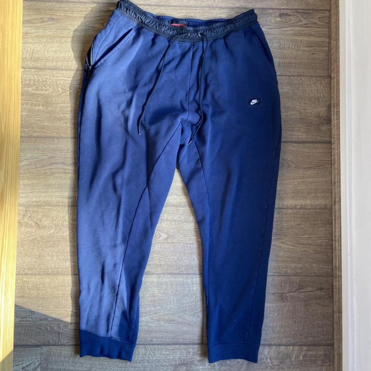 Nike navy blue sweatpants / joggers / tracksuit... Depop