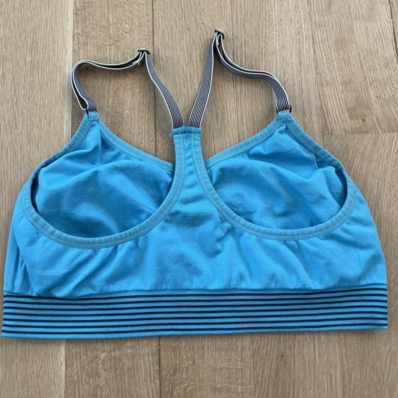 Cute bright blue sports bra from new balance. Has... - Depop