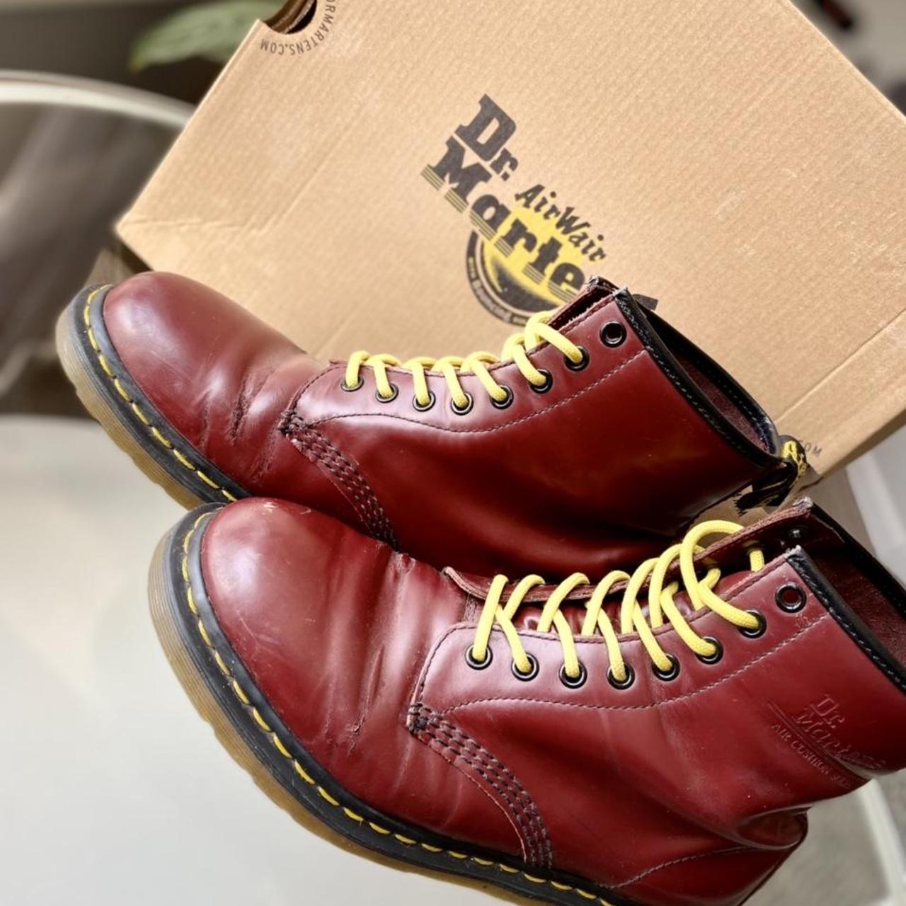 cherry red doc martens yellow laces