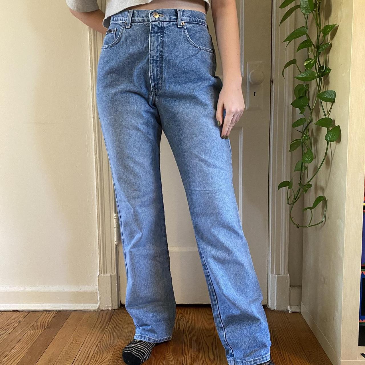 Light wash boot cut jeans by New York and company... - Depop