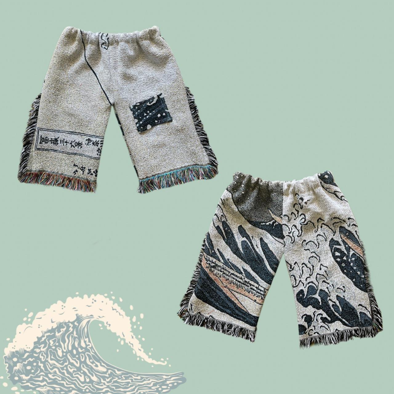 This pair of bermuda blanket shorts features a wave... Depop