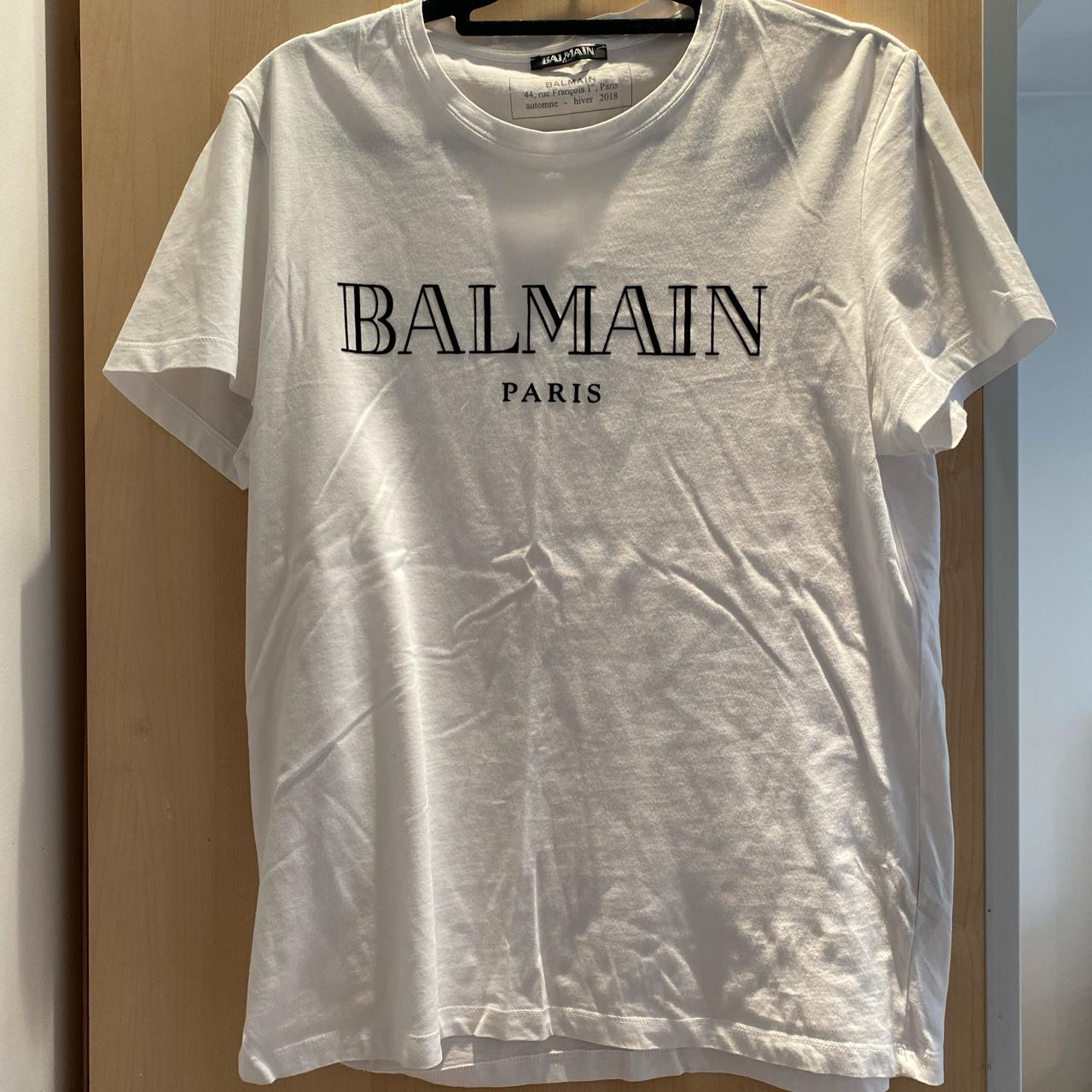 white shirt with black writing