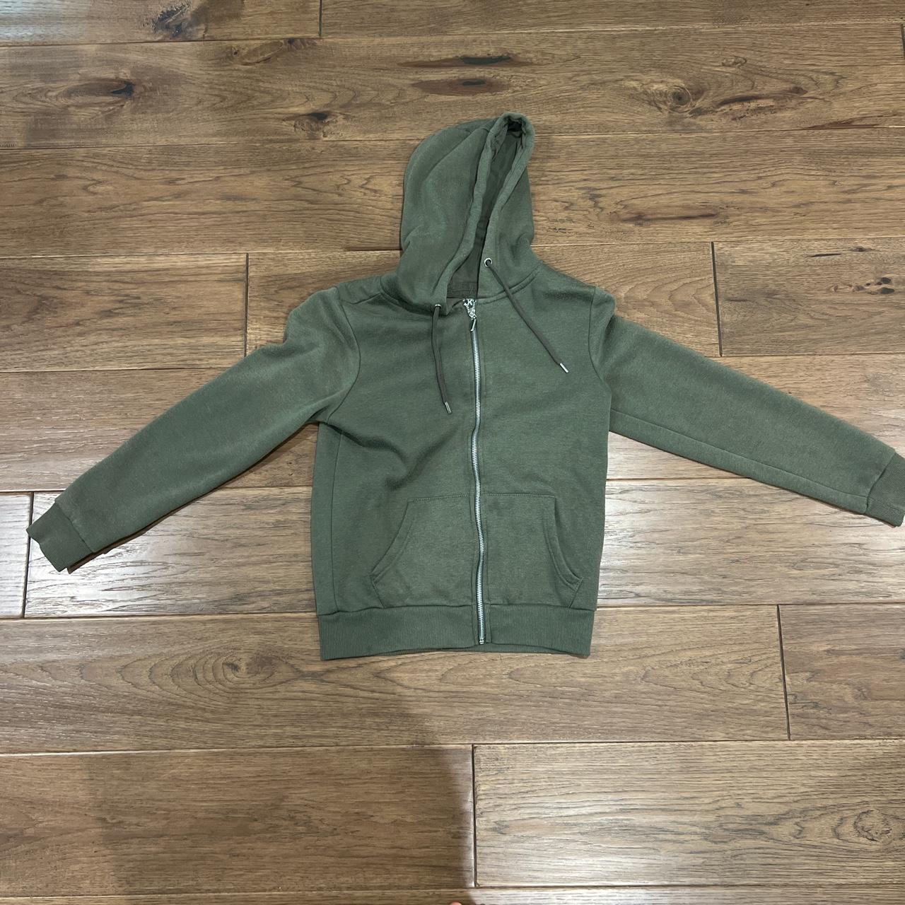 Primark green zip up hoodie. Looks similar to the... - Depop