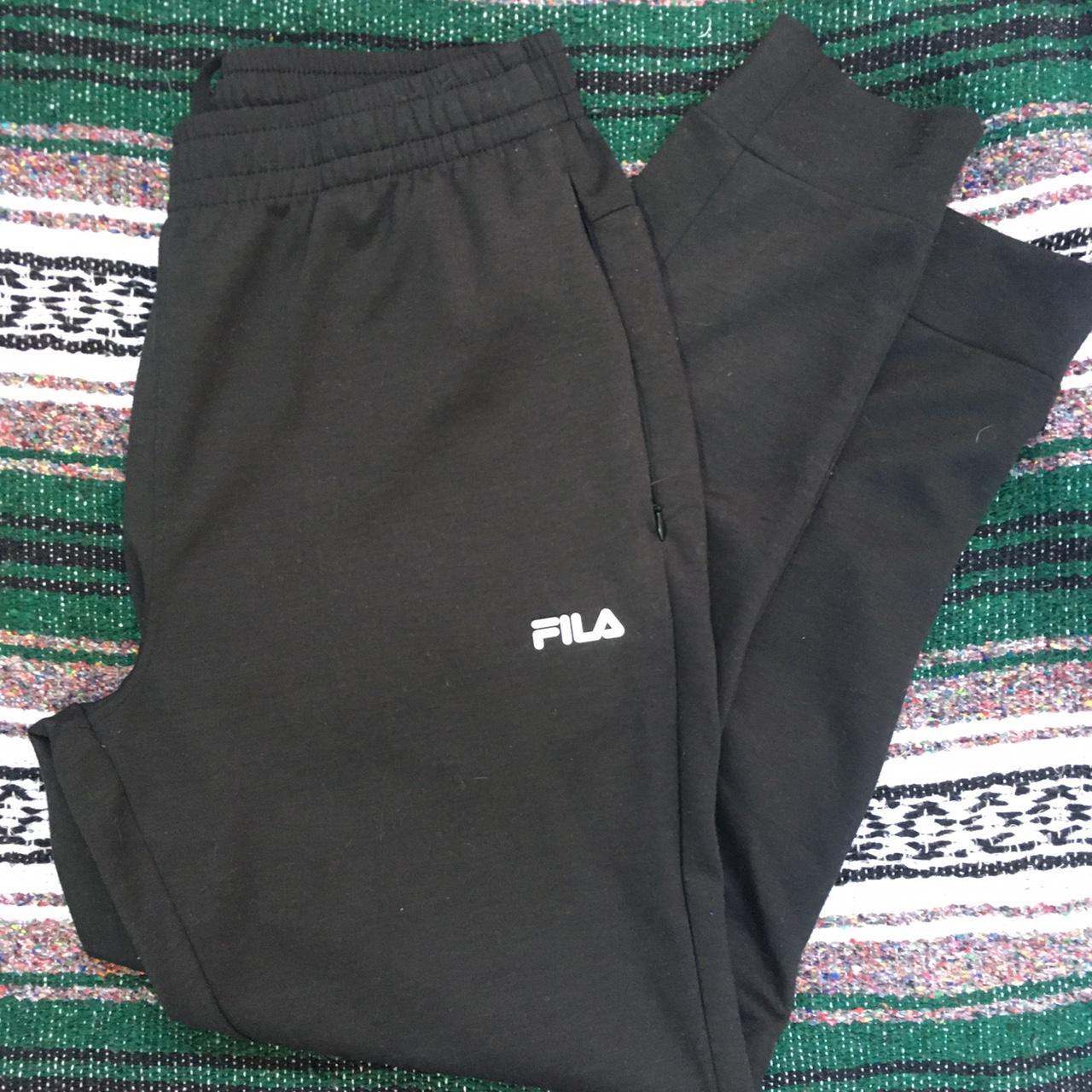 These Fila joggers are super comfy and have zipper... - Depop