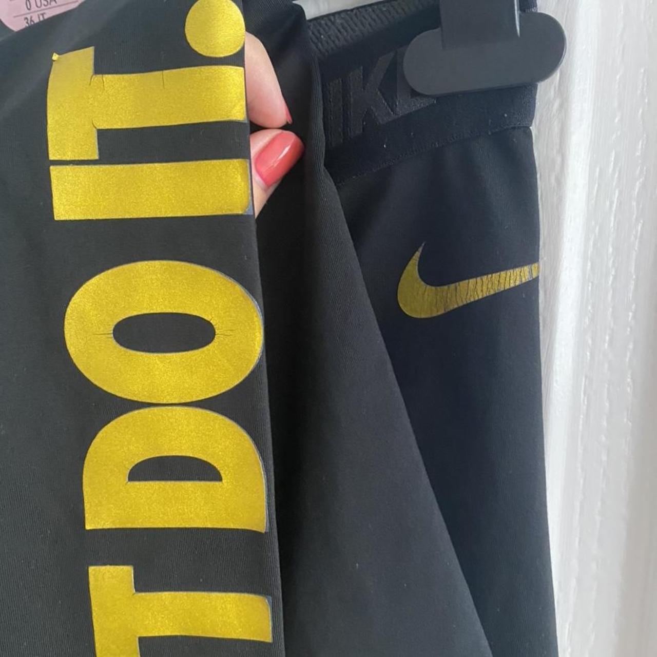 nike gold tick leggings