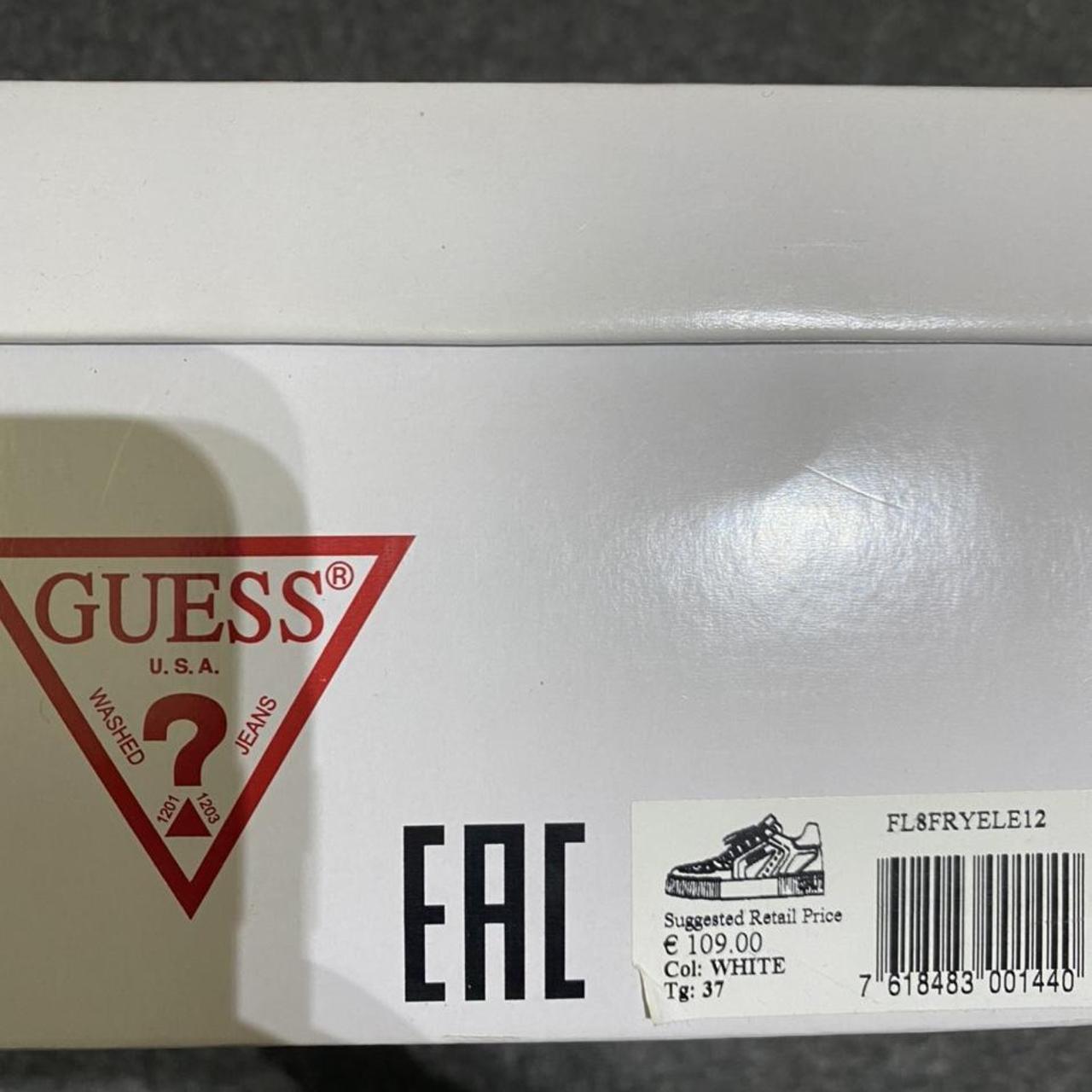 guess black and gold trainers