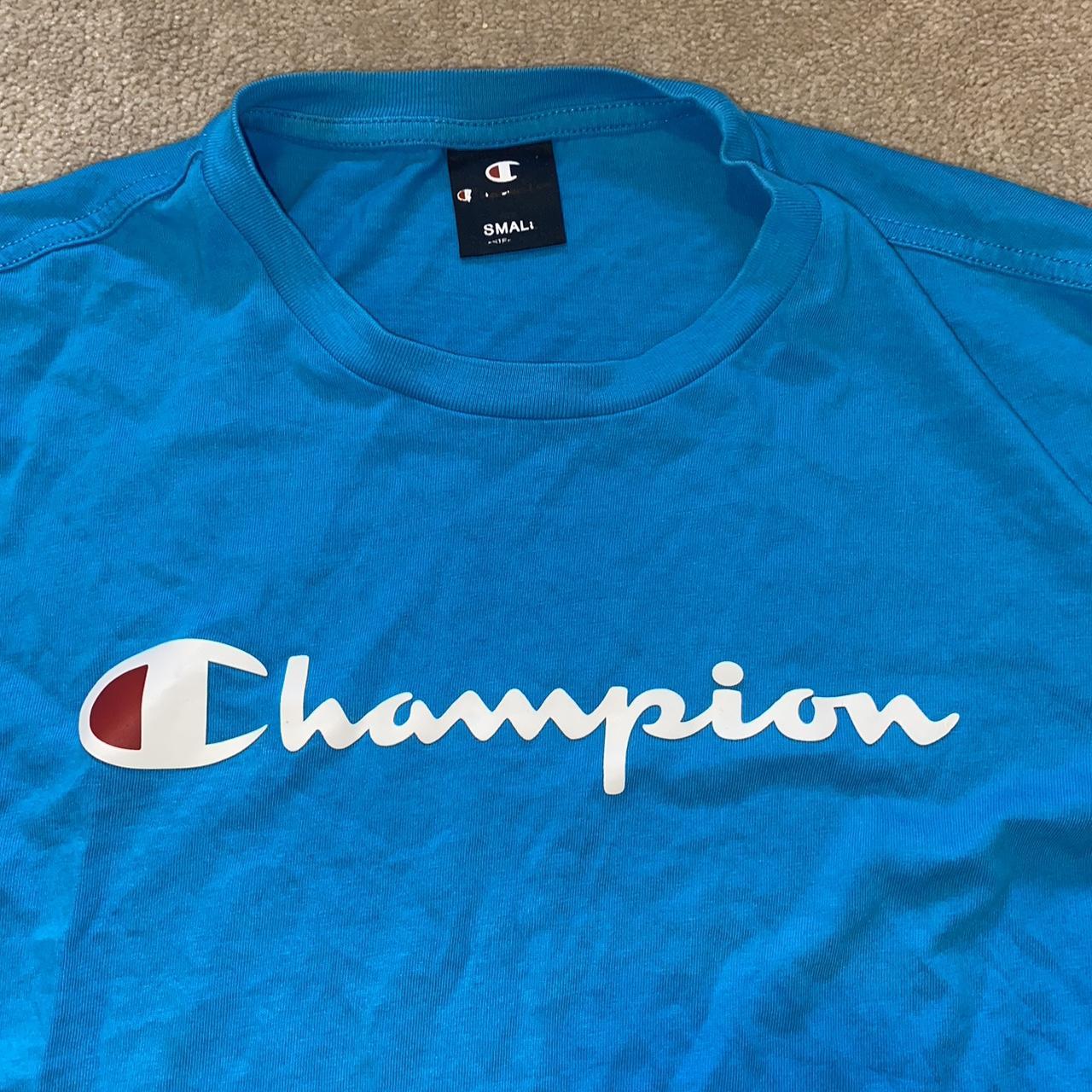 Champion Men's Blue T-shirt | Depop