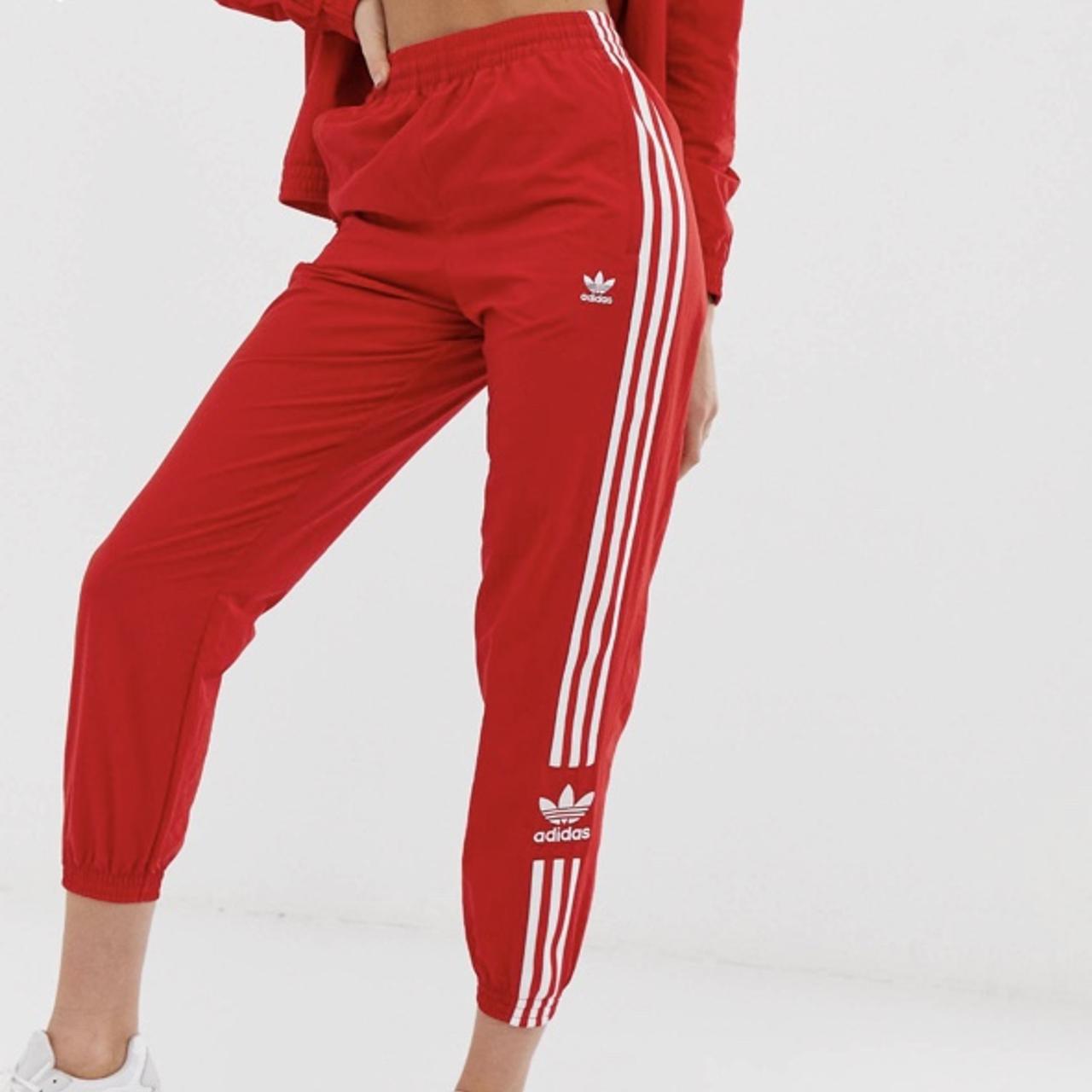 Red Adidas Stripe logo Track pants. Super comfy Depop