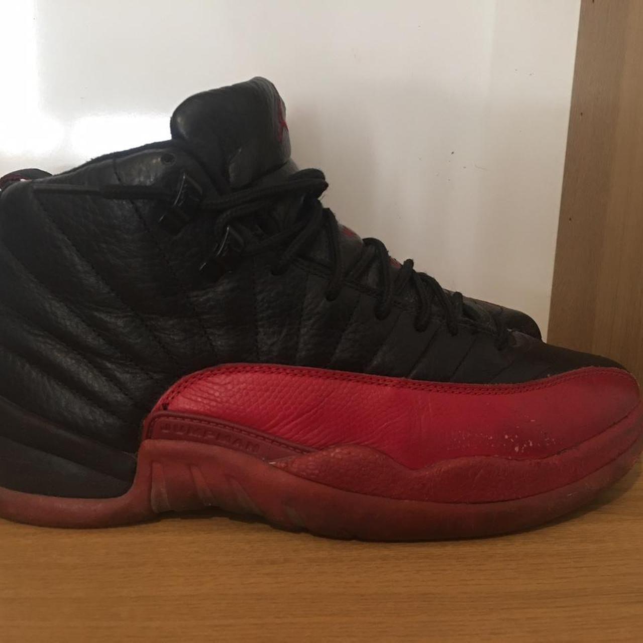 black and red jordan 12