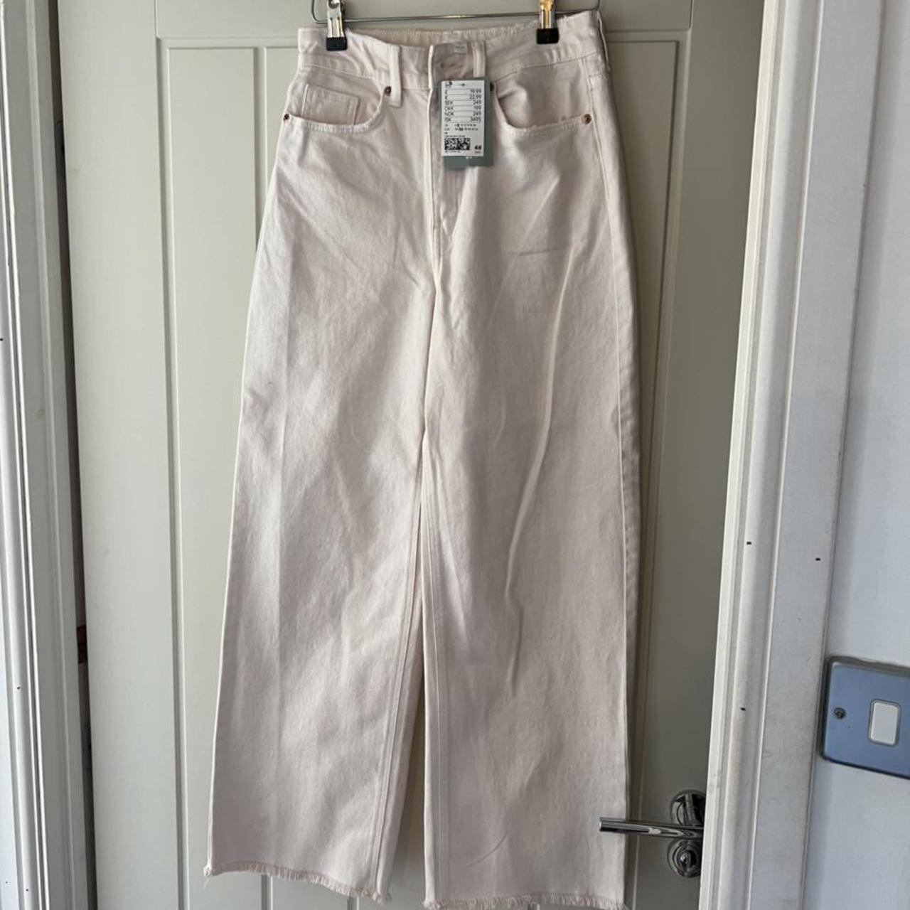 H&M beige wide leg trousers. Brand new with tags... Depop