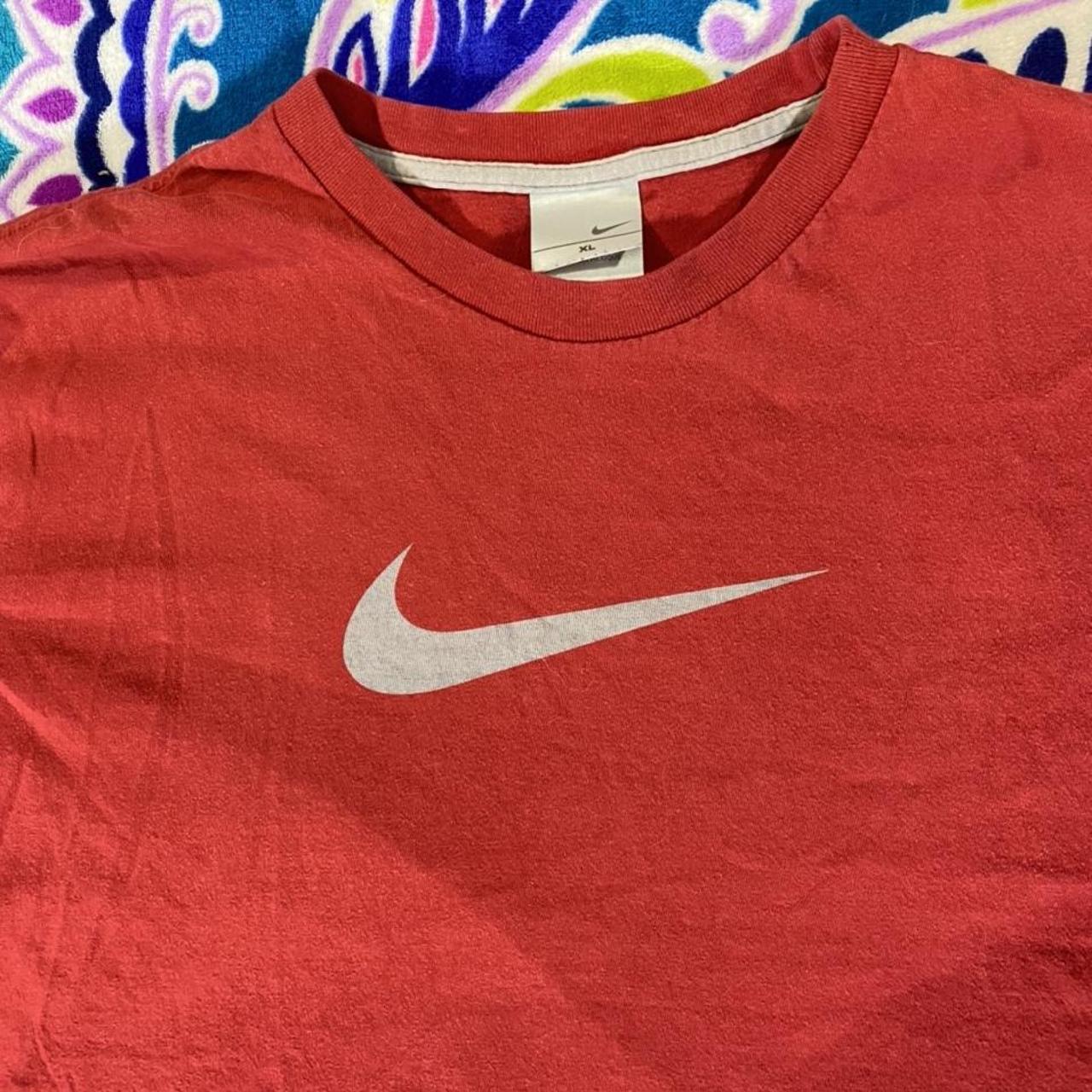 Vintage Nike center swoosh t shirt! This shirt is... - Depop