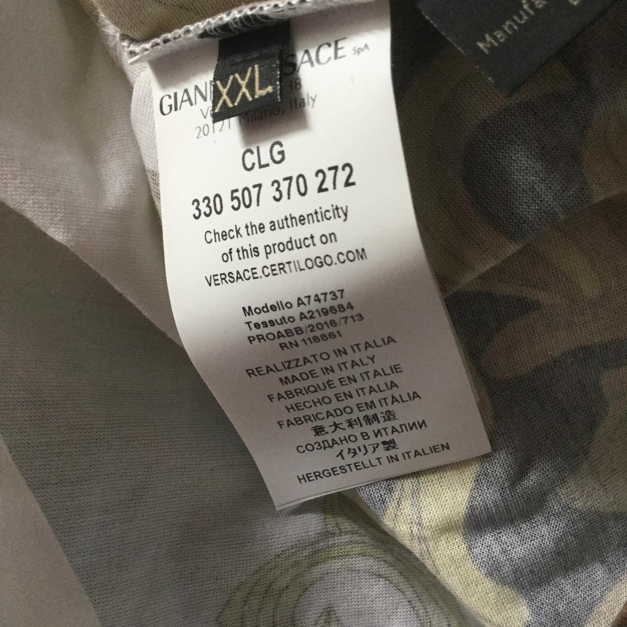 Versace white and gold t shirt See pictures for... - Depop